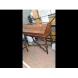 A continental walnut bureau with fitted interior,