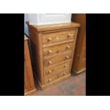 A pine chest of five drawers - width 63cms
