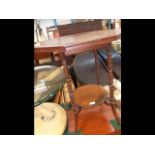 A Victorian octagonal two tier occasional table