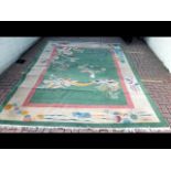A Chinese floral pattern carpet approx. 12ft x 9ft