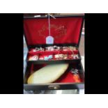 A jewellery box of assorted costume jewellery incl