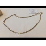 A 9ct yellow and white gold necklace - 12.5 grams