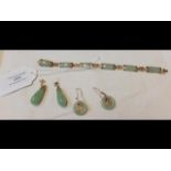 A gold and jade bracelet with matching earrings, t