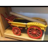 An old hand painted wooden model cart