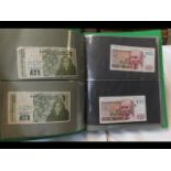 An album of collectable bank notes from around the