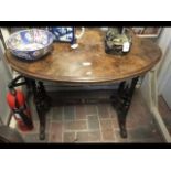 A Victorian oval walnut occasional table
