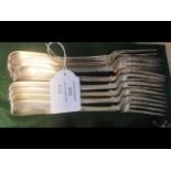 A selection of eight silver dining forks - 633 grams