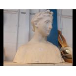 A 50cm high plaster bust of a classical female