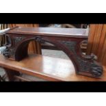 A decorative mahogany door pediment