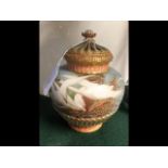 A hand painted Royal Worcester pot-pourri jar and