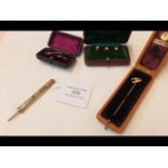 A gold horseshoe tie pin, cased studs etc