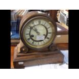 An oak drumhead mantel clock, circa 1900 - height