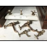 A vintage set of Victorian brass taps together wit
