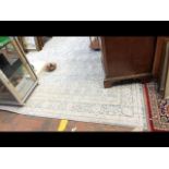 A Middle Eastern style carpet square with geometric border - 300cm x 230cm