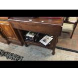A two tier mahogany occasional table together with