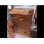 An antique eight drawer specimen chest with handle