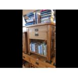 A light oak two drawer side table - height 88cms