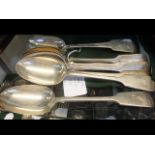 A set of ten silver serving spoons,