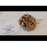 An 18ct gold flower brooch, 21.5 grams