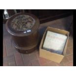 A Victorian circular commode with various books