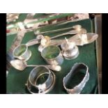 Silver napkins rings, sugar tongs etc