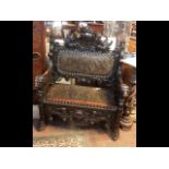 An impressive period Italian? carved bench with co