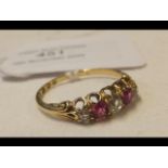 A ruby and diamond ring in 18ct gold setting