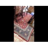 A Middle Eastern carpet with geometric border and