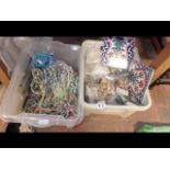 Two plastic containers of costume jewellery and co