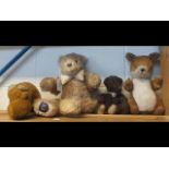 A collectable Merrythought teddy bear and others