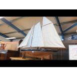 A reproduction two masted pond yacht