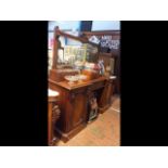 A 19th century mahogany sideboard with mirror to b