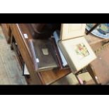 Several old photograph albums with metal clasps et