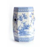 A CHINESE BLUE AND WHITE HEXOGANOL GARDEN SEAT with leaf and flower head decorated top above a