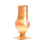 A TIFFANY FAVRILE IRIDESCENT FOOTED BALUSTER VASE with moulded panelled body 20.5cm high -