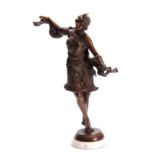 ARMAND GODARD AN ART DECO BRONZE SCULPTURE OF A YOUNG LADY - signed A. Godard mounted on a white