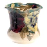 A WILLIAM MOORCROFT BURSLEM SMALL JARDINIERE of bulbous form with flared body and square-lipped rim,