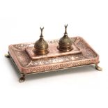 A 19TH CENTURY COPPER AND BRASS PERSIAN STYLE INK STAND with dome-shaped lids and Turkish moons