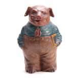 A LATE 19th CENTURY AUSTRIAN POLYCHROME TERRACOTTA NOVELTY LIDDED JAR modelled as a pig in blue