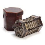 A LATE 19th CENTURY CONCERTINA BY CHARLES JEFFRIES having pierced nickel ends with 37 nickel