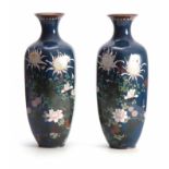 A LARGE PAIR OF CHINESE DARK BLUE GROUND HEXAGONAL TAPERING SHOULDERED VASES with extensive flower