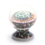 AN INTERESTING FOOTED GLASS MUSHROOM PAPERWEIGHT with white gauge foot band and girdle beneath a