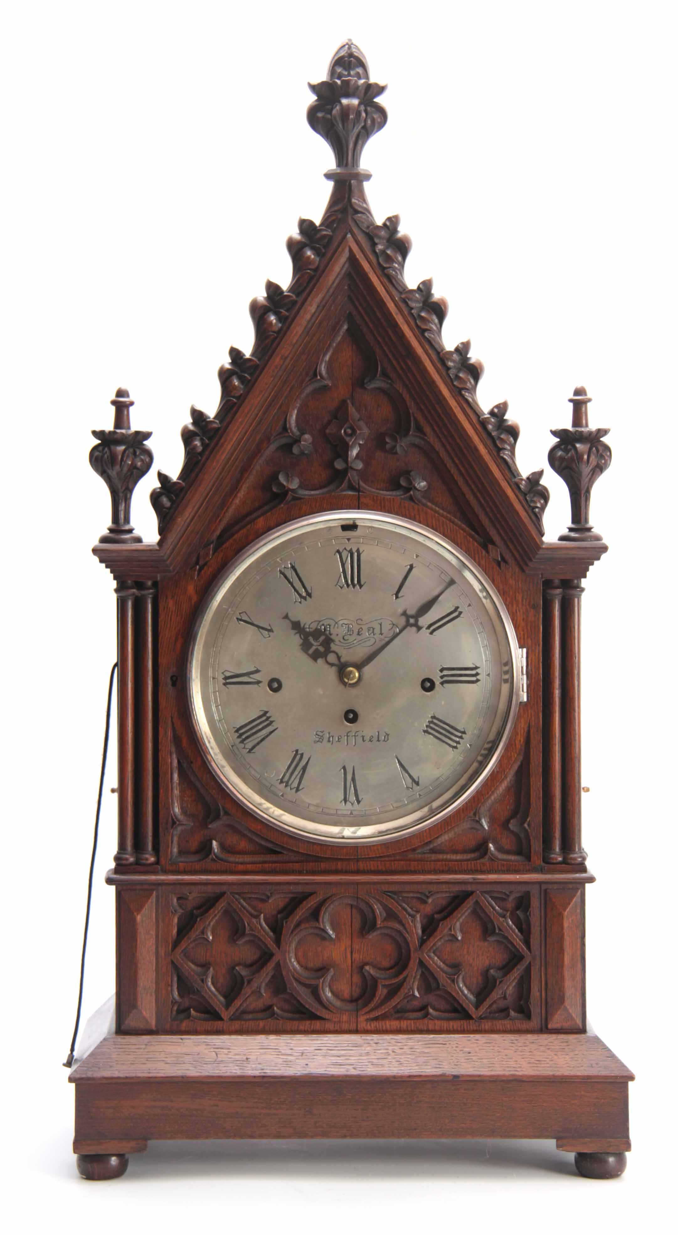 M. BEAL, SHEFFIELD A GOTHIC OAK CASED TRIPLE FUSEE BRACKET CLOCK the case with gothic carved