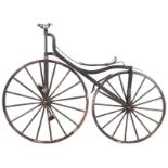 A MID 19th CENTURY VELOCIPEDE "BONESHAKER" BICYCLE having an iron frame and painted wooden spoke