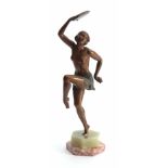 AN ART NOUVEAU STYLE COLD PAINTED BRONZED METAL SCULPTURE OF A HALF NAKED TAMBOURINE DANCER - on a