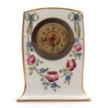 A JAMES MACINTYRE AND CO BURSLEM MOORCROFT MANTEL CLOCK of shaped rectangular form with gilt edge