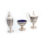 AN EARLY 20TH CENTURY ADAM STYLE THREE-PIECE SILVER CONDIMENT SET of urn-shaped pierced form with