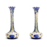 AN UNUSUAL PAIR OF JAMES MACINTYRE PEACOCK DESIGN FLORIANWARE SQUAT BULBOUS SLENDER TAPERING VASES