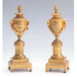 A PAIR OF 19TH CENTURY FRENCH ORMOLU CLASSICAL URN SHAPED CANDLESTICKS the reversible sconces with