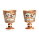 A JAPANESE KUTANI WARE FOOTED SAKI CUPS with tapering faceted bodies depicting figure and